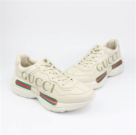 rhyton gucci logo leather sneaker price|Gucci rhyton black and white.